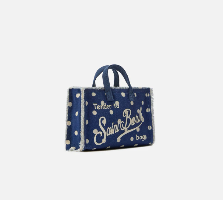 Micro Phone blue polka dot canvas bag with contrasting logo
